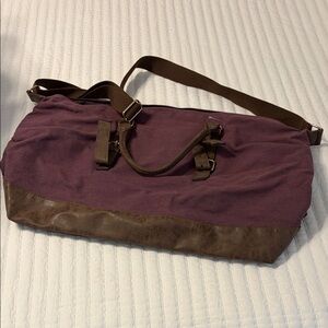 Purple and brown weekender bag